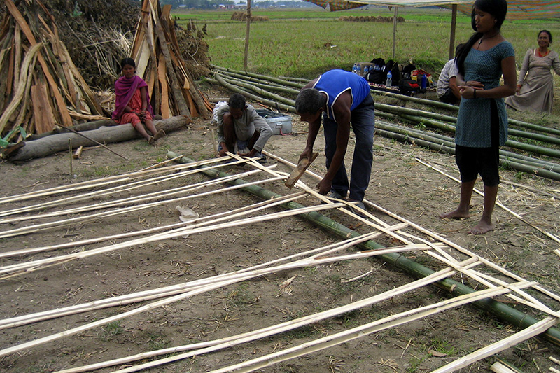 Weaving bamboo into walls