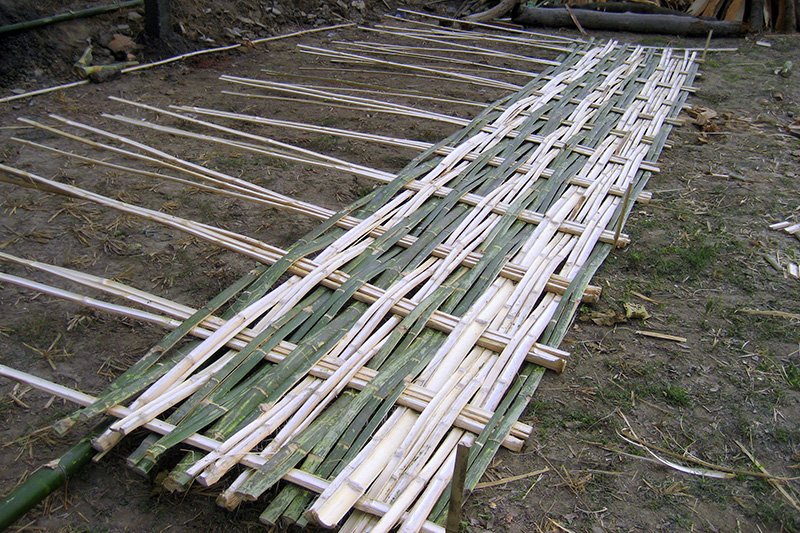 Woven bamboo walls for Nepali bamboo house construction