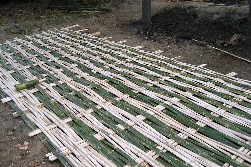 Woven bamboo walls for Nepali bamboo house construction