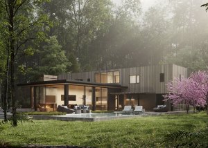 A modern house with a lot of glass in the woods