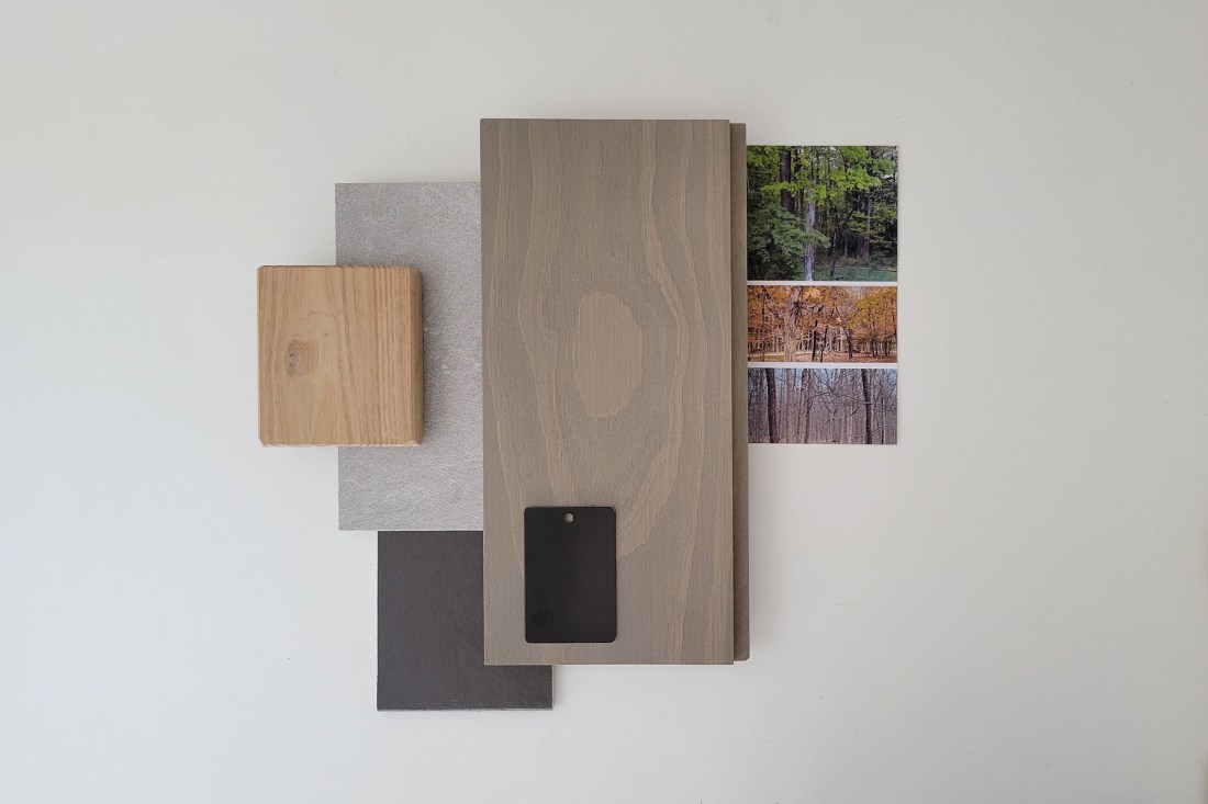 Exterior material palette for a modern house in the woods that blends in with the surrounding trees