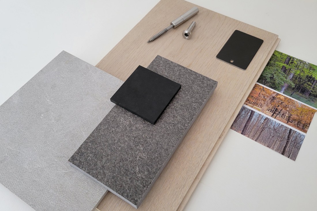 Interior material palette for a modern house in the woods that is warm, industrial, and earthy